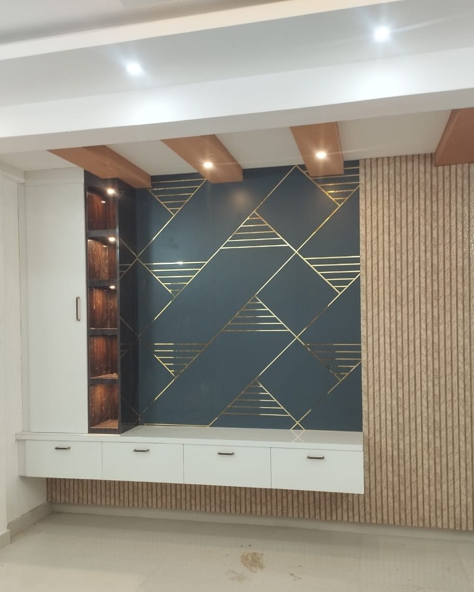 Television panel in teal lacquer with fine brass inlay, by Padmodya Interiors